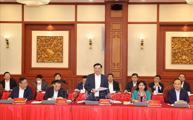 Đồng chí Đinh Tiến Dũng, Ủy viên Bộ Chính trị, Bí thư Thành ủy Hà Nội phát biểu tại buổi họp. Ảnh: Trí Dũng/TTXVN