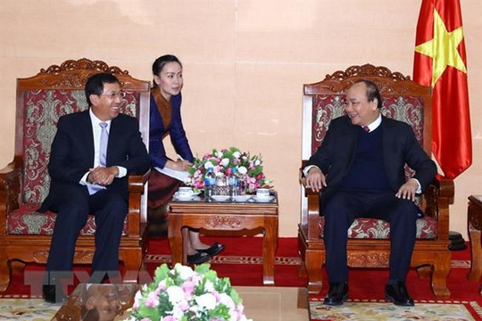Thủ tướng đề nghị Ngân hàng Nhà nước Việt Nam tiếp tục hỗ trợ Lào