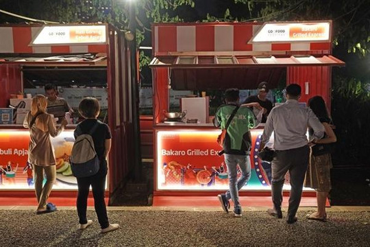 Grab và Gojek đang “chiến” dữ dội trên thị trường giao đồ ăn trực tuyến